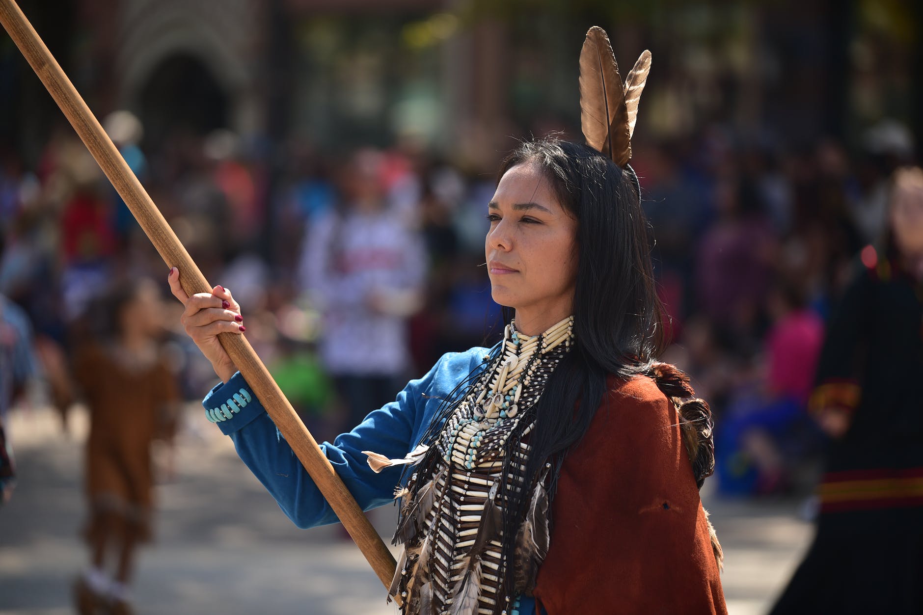 a woman in traditional native american clothing