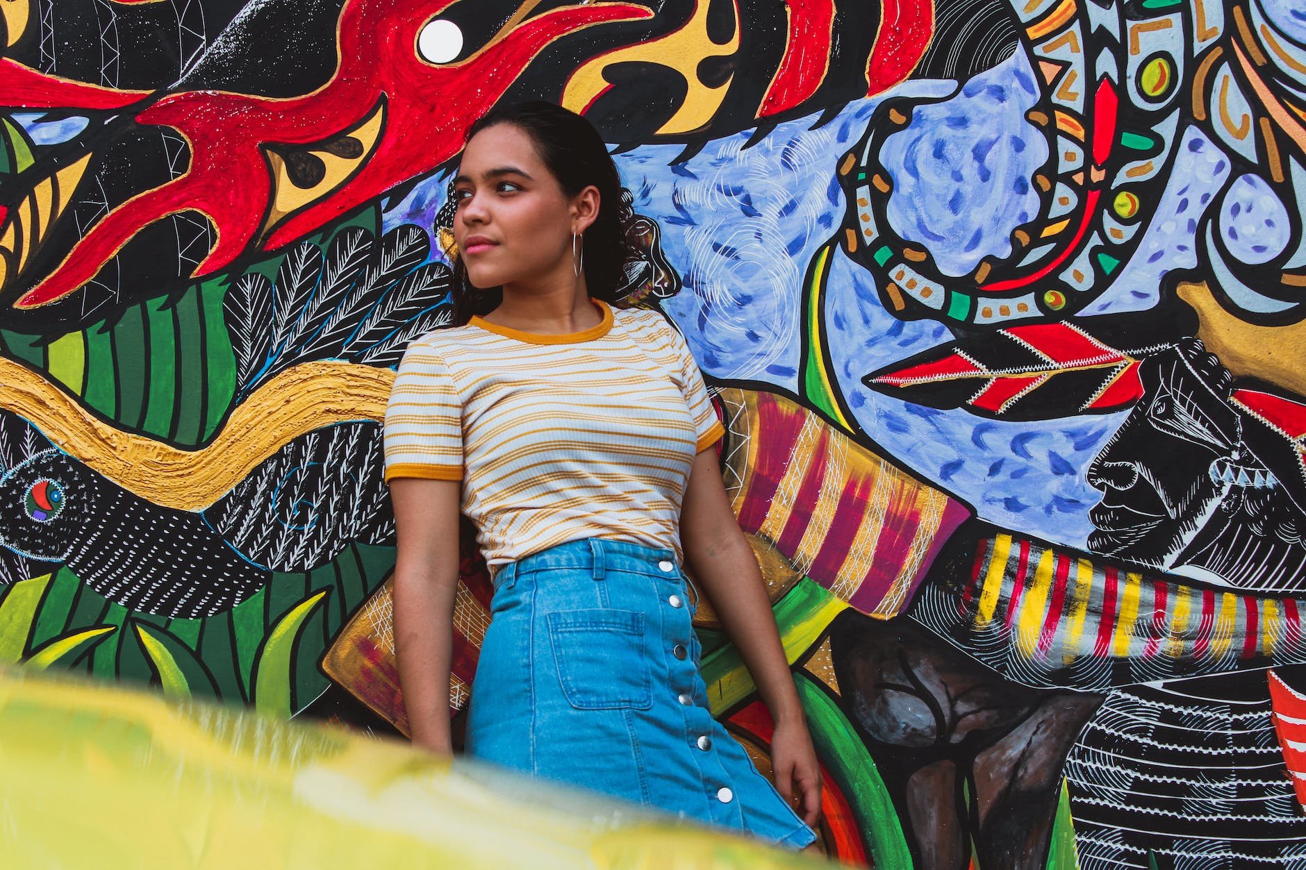 woman leaning on wall