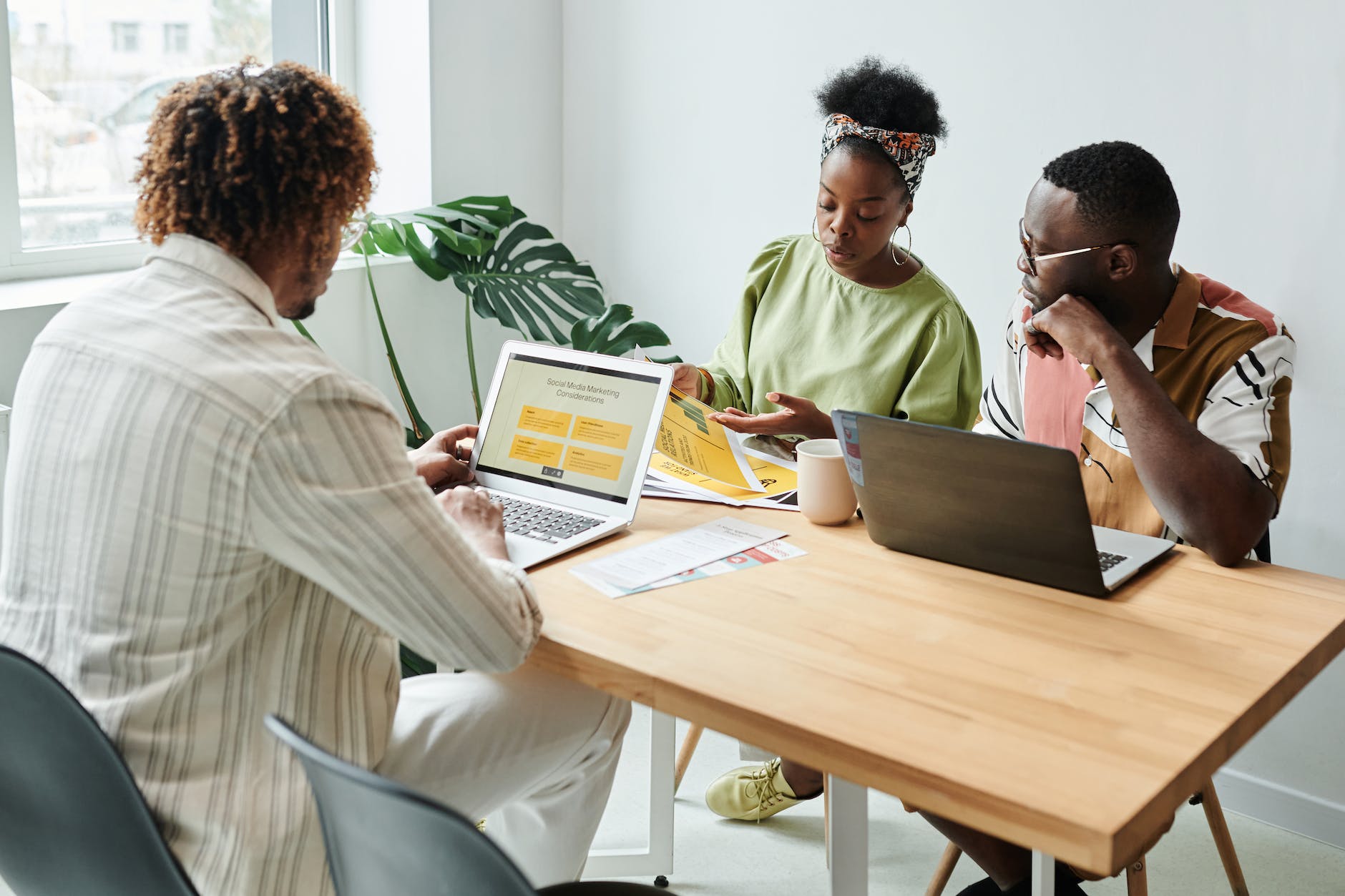 a group of people having a meeting